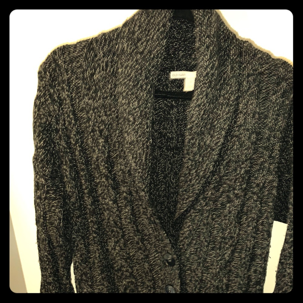 Long button up fold collar sweater.